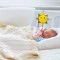 Мягкая музыкальная игрушка на кроватку Clementoni soft sun, арт. 17795
